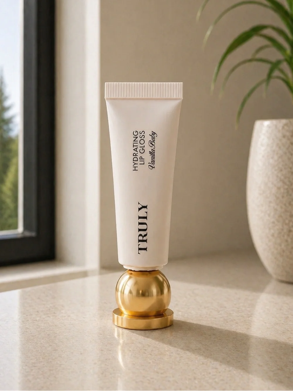 $29 New Truly Hydrating Lip Gloss - Vanilla Baby